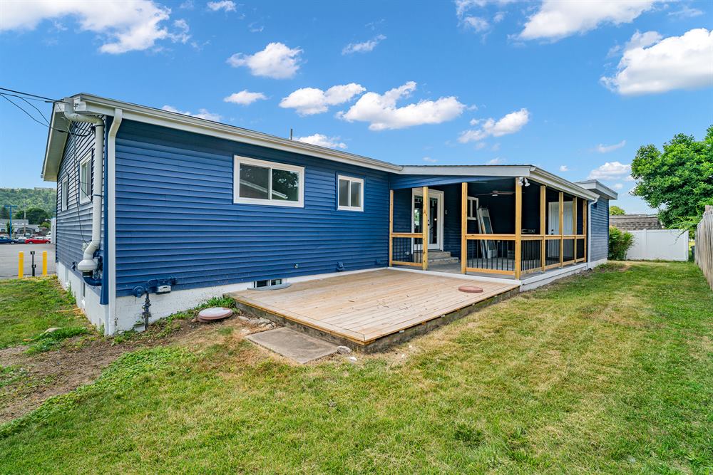 Rear exterior with new deck and screened porch